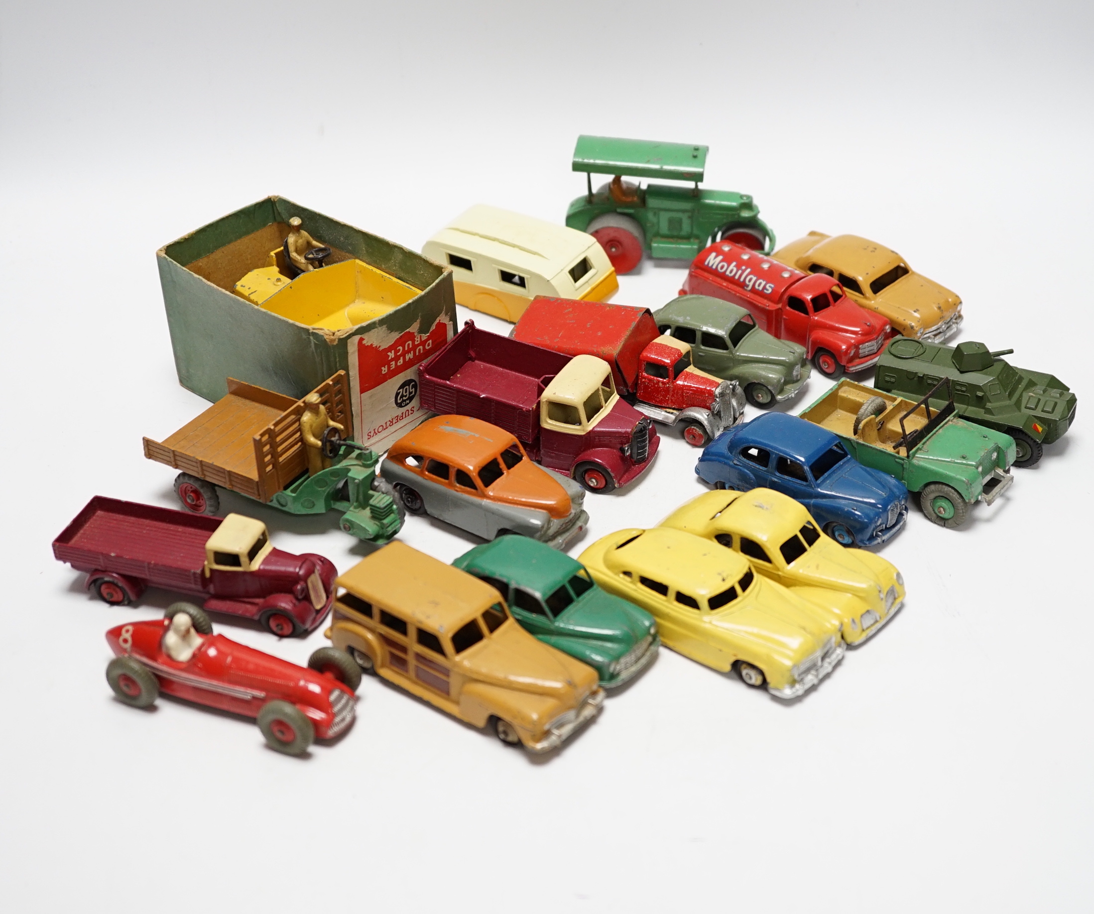 Nineteen Dinky Toys including; Mobilgas Tanker, Ford Sedan, Austin Devon, Austin Somerset, Standard Vanguard, Bedford Tipper, Hudson Sedan, etc.